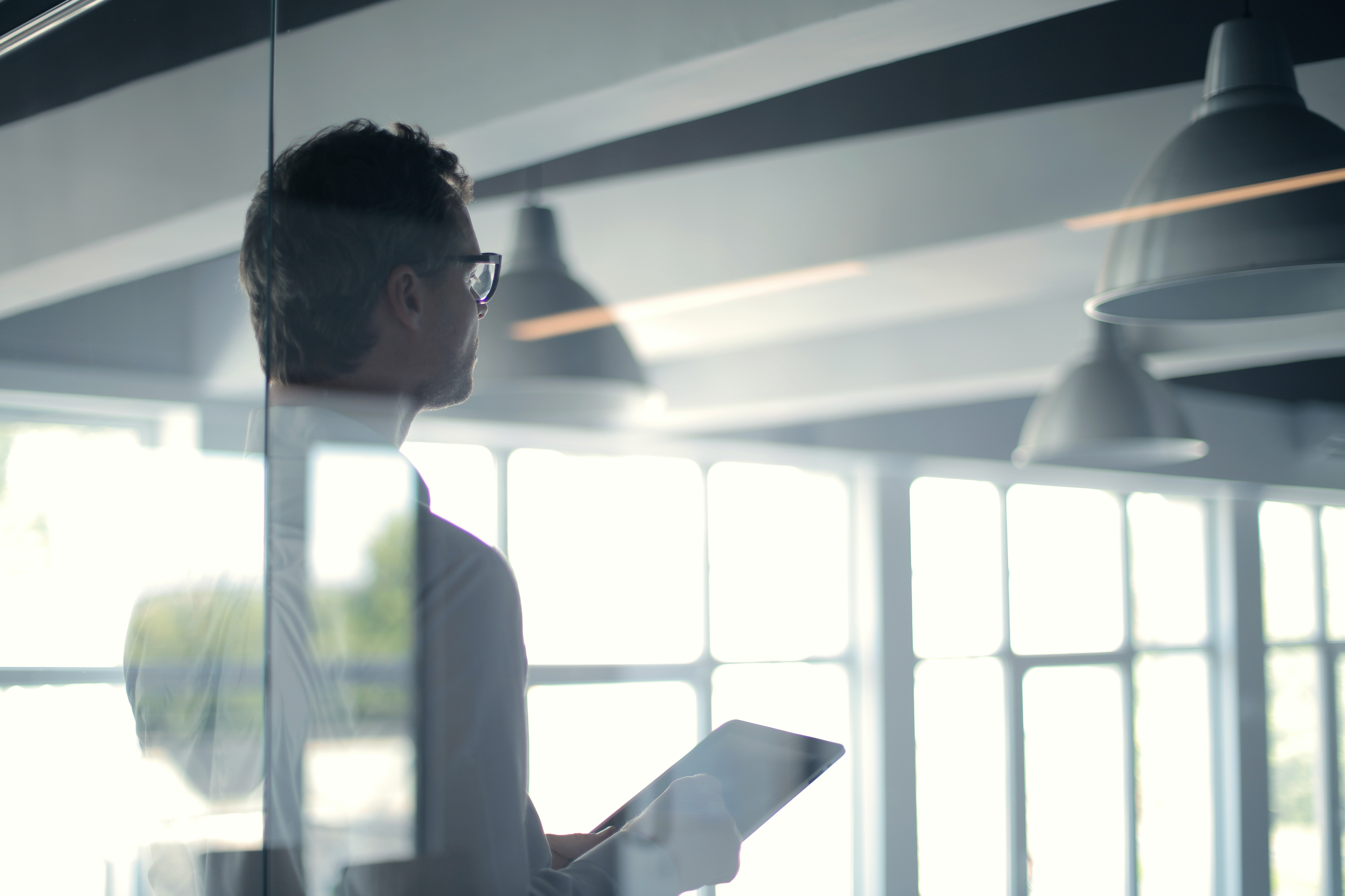 businessman walking through an modern office