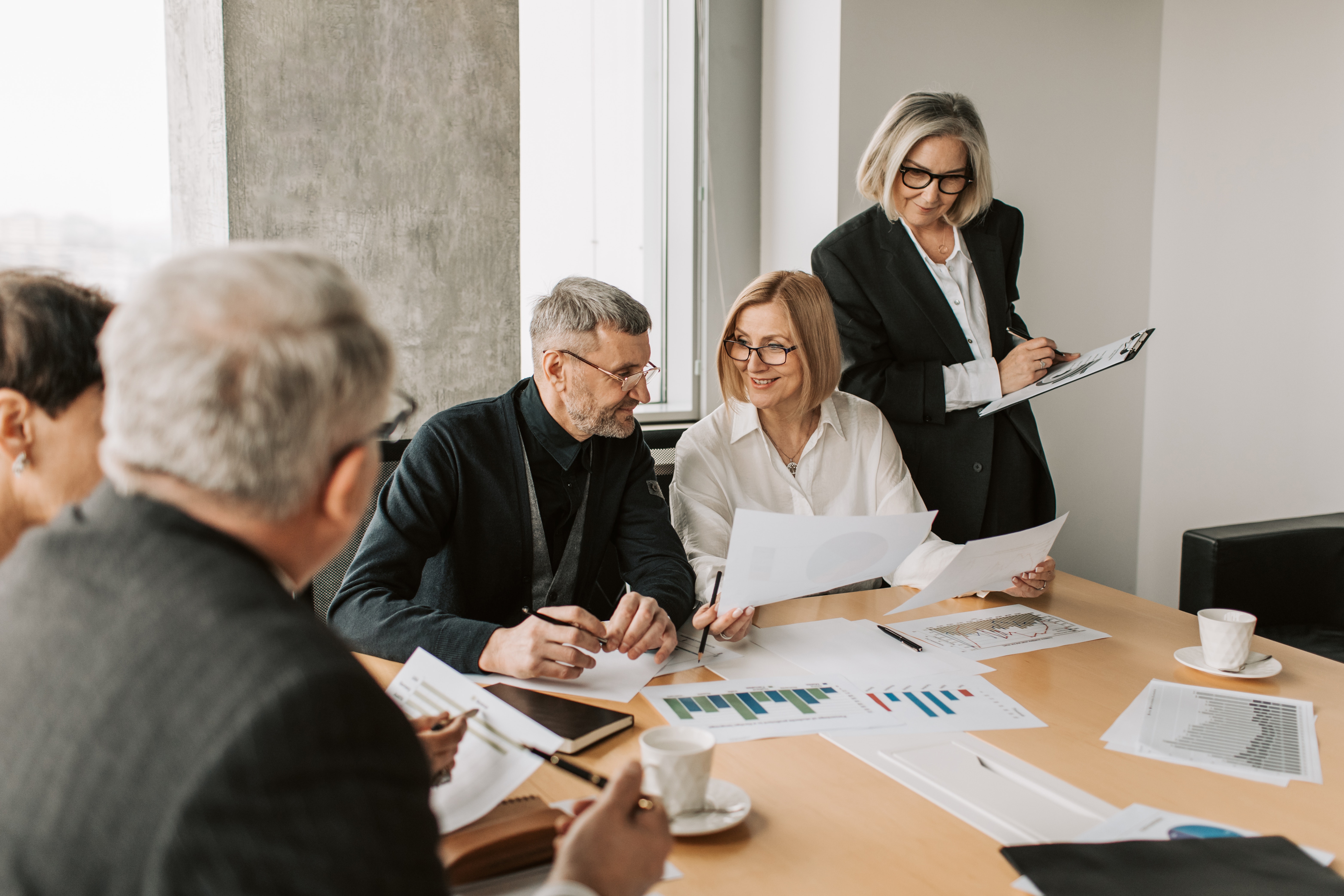 a group of business people having a meeting