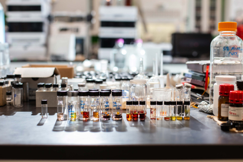 a row of vials in a chemistry lab.