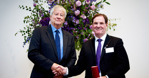 Alan Evans receiving his award.