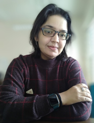 A person with her arms crossed
