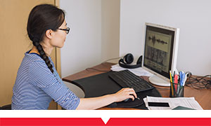 Staff member working at her desk