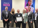 Dr Rosenblatt receiving an award
