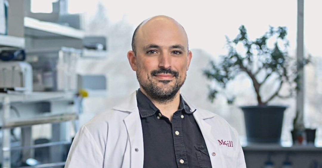 Professor Lawrence Kazak poses in a laboratory