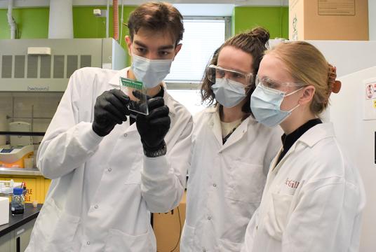 three student researchers