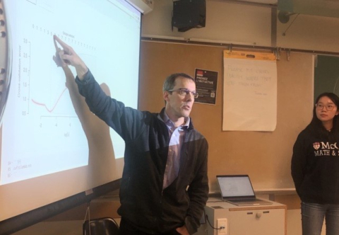 Professor Eric Kolaczyk instructs MATH 527 students