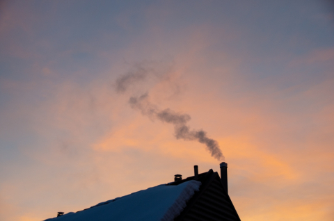 Smoke exiting a house