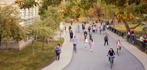 Students walking along the promenade. 