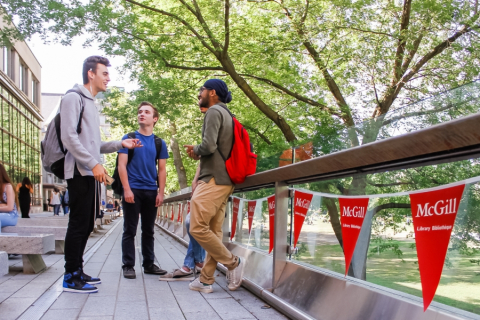 Image of students speaking in a small group