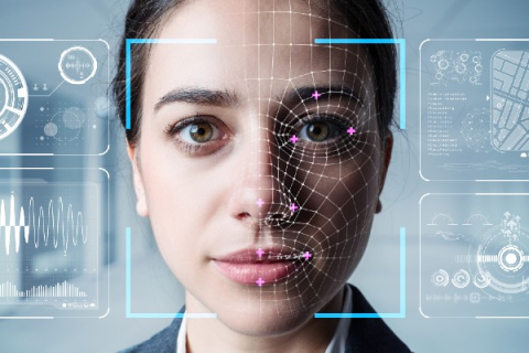 A woman's face is overlaid with computer data and analysis