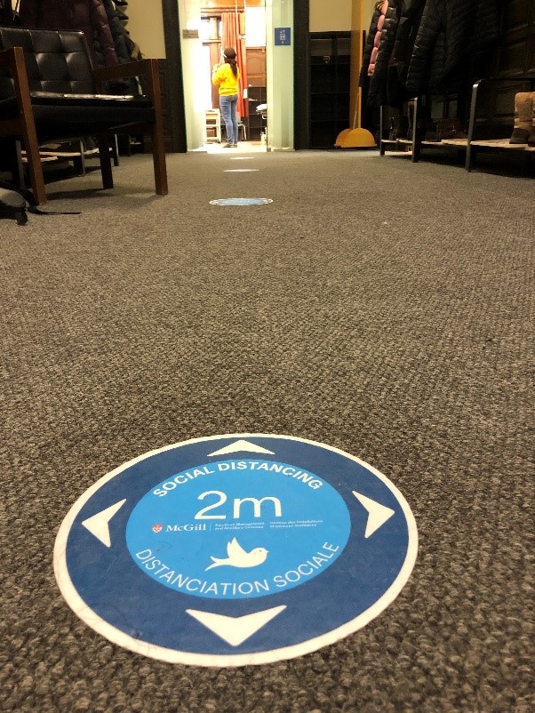Blue Circle, empty hallway, classroom at the end