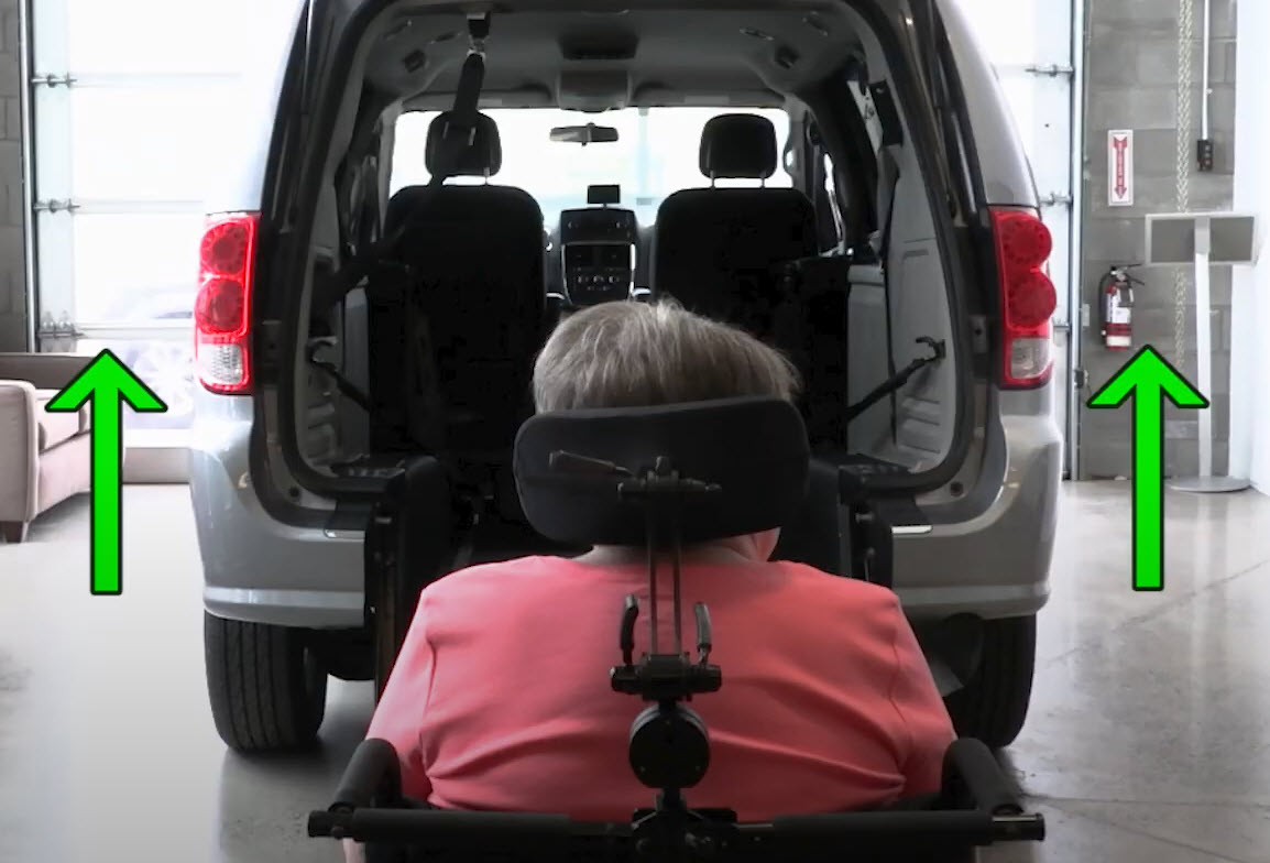 Wheelchair User about to enter an adapted van from the rear entry
