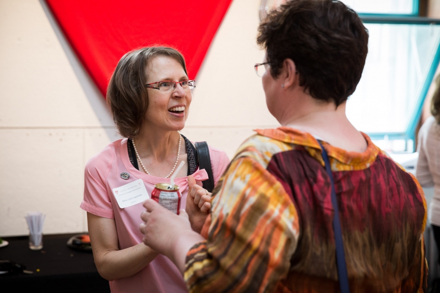 faculty and award winners mingling