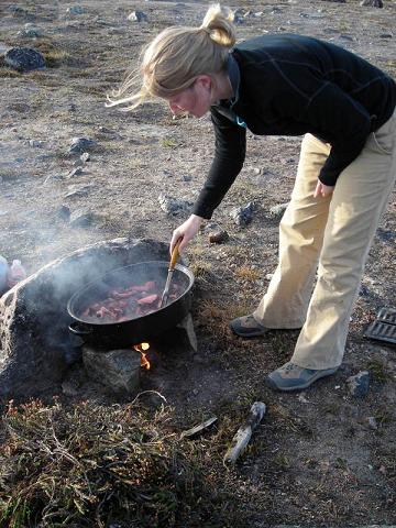 Cooking seal meat - Copyright Noor Johnson