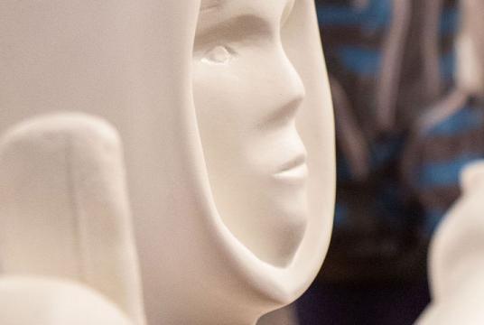 A close up of a statue