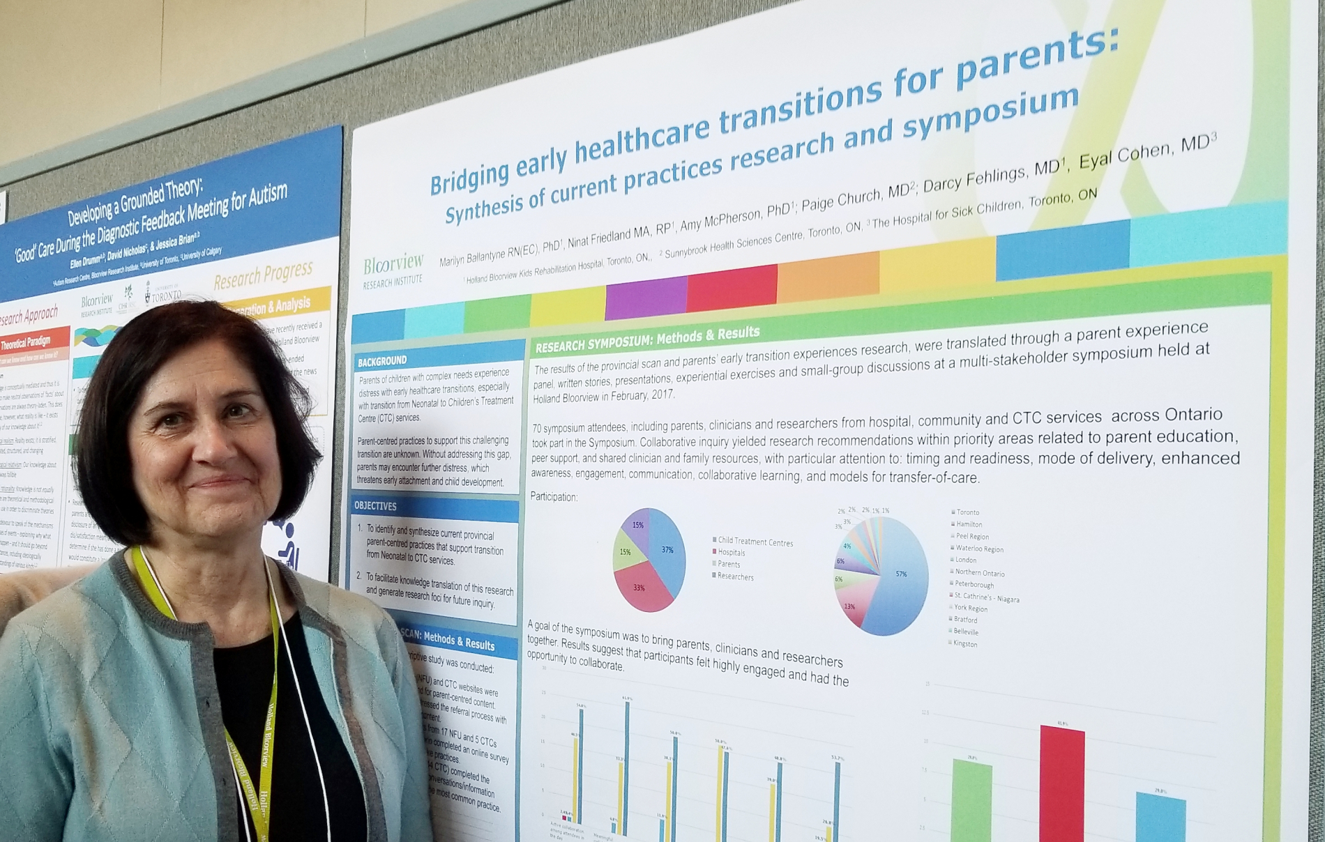 Marilyn Ballantyne stands in front of a presentation poster titled "Bridging early healthcare transitions for parents"