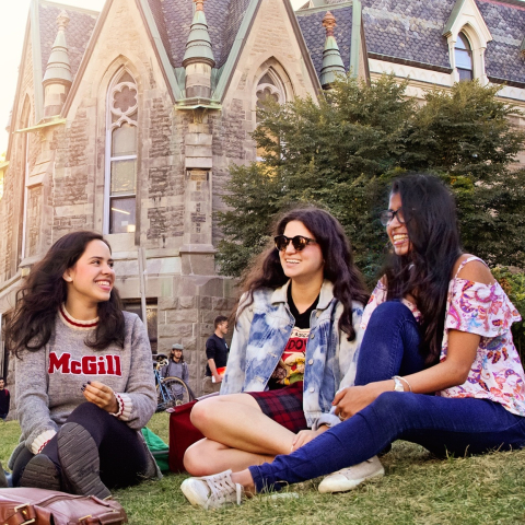 McGill students resting on the campus's grounds
