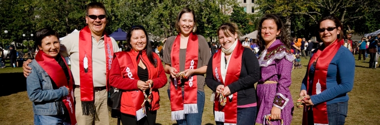 Seven smiling Indigenous students.