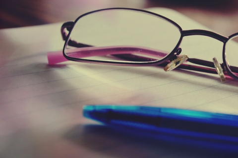 eyeglasses and pen