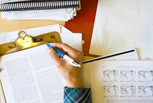 Notepad and papers on a desk