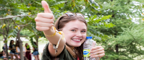 a student giving a "thumbs up"