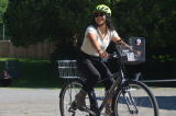 A McGill community members rides one of Gault's new bicycles around the campus. 