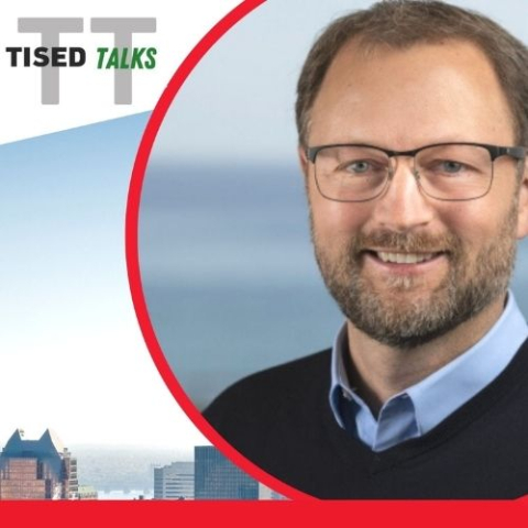 TISED TALKS logo with skyline of Montreal in the day and headshot of Dr. Eric Masanet
