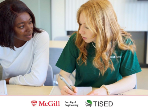 two female students working ona paper