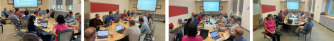 professors working at a table in fornt of screen