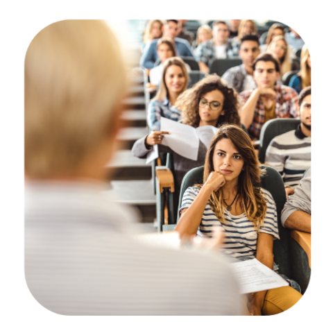 a male professor speaking to students