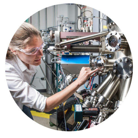 woman working on equipment in factory