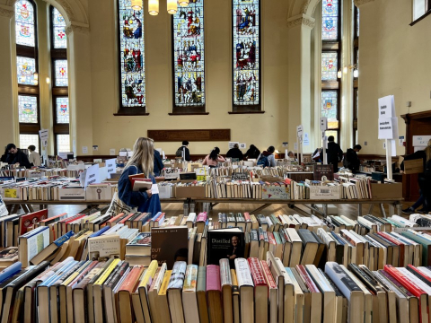 a book sale in a large hall