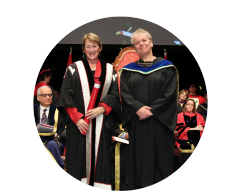 The McGill Principal poses with Lifetime Achievement Award recipient