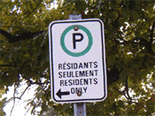 Residents only parking sign.