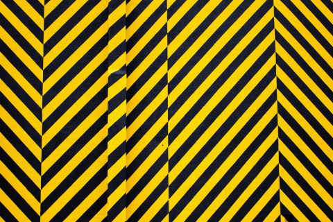 yellow black striped caution paper 