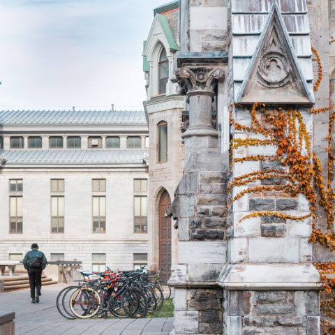 Student walking on downtown campus