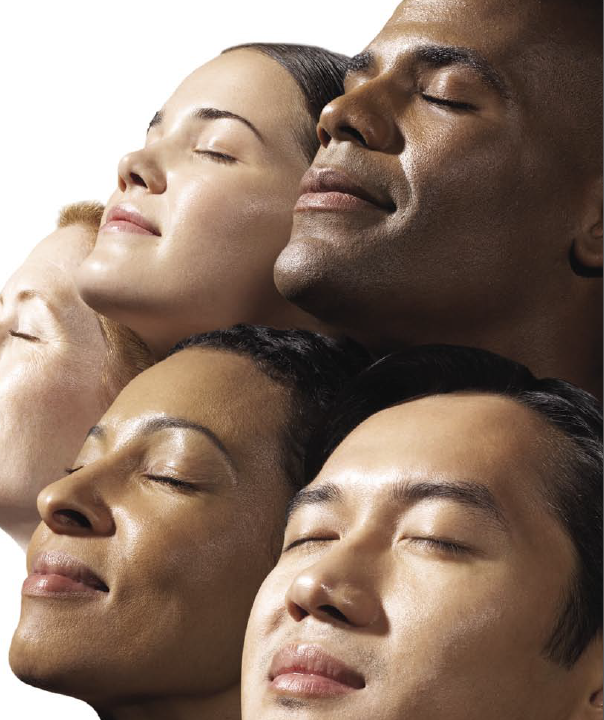 Group of people with eyes closed facing sun. Copyright 2007 Scientific American, Inc.