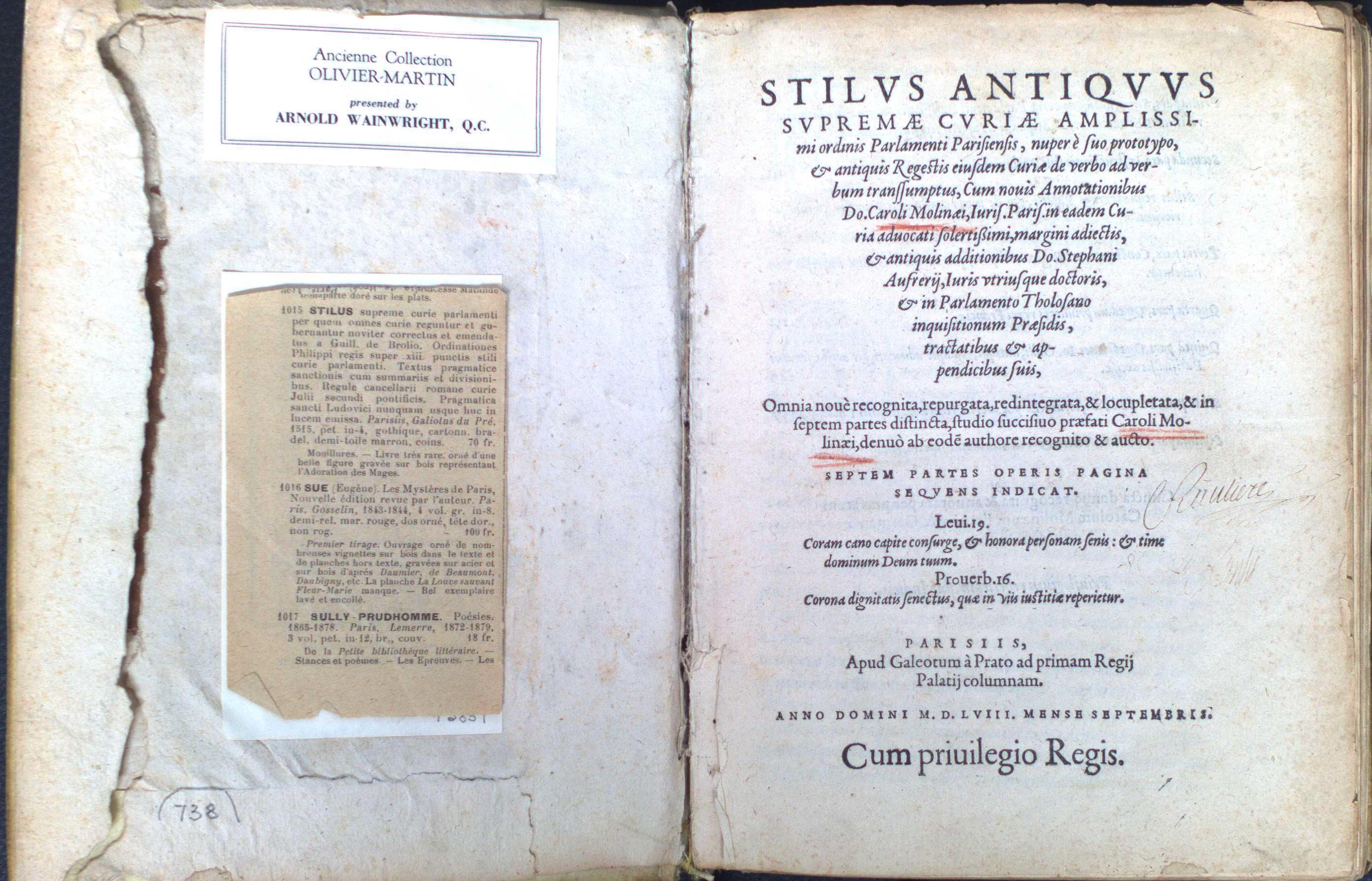 Inside cover of a book with cuttings and markings