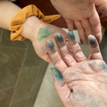 hands with marker on fingertips