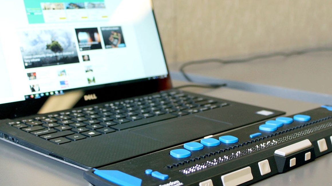 Laptop computer with a refreshable braille display.